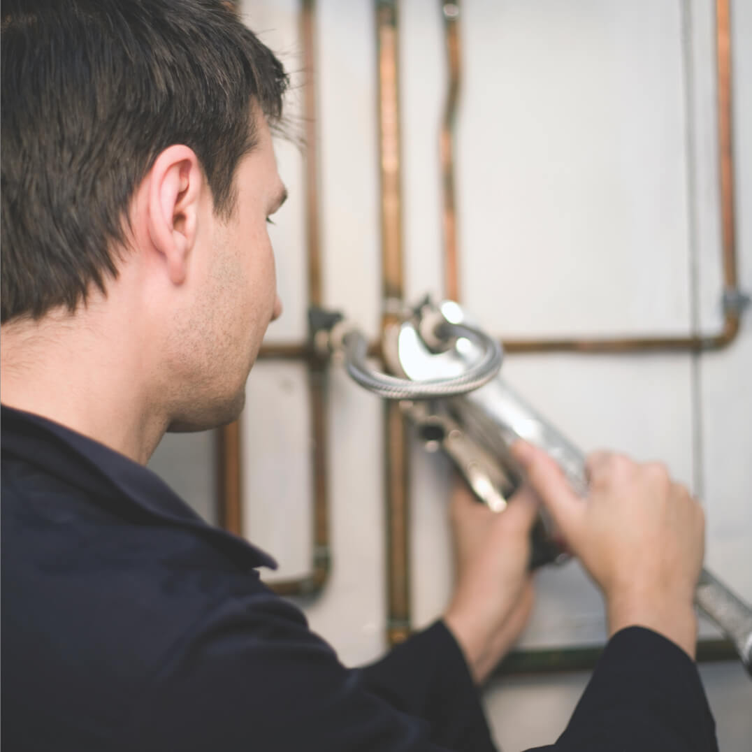 Man fixing pipe