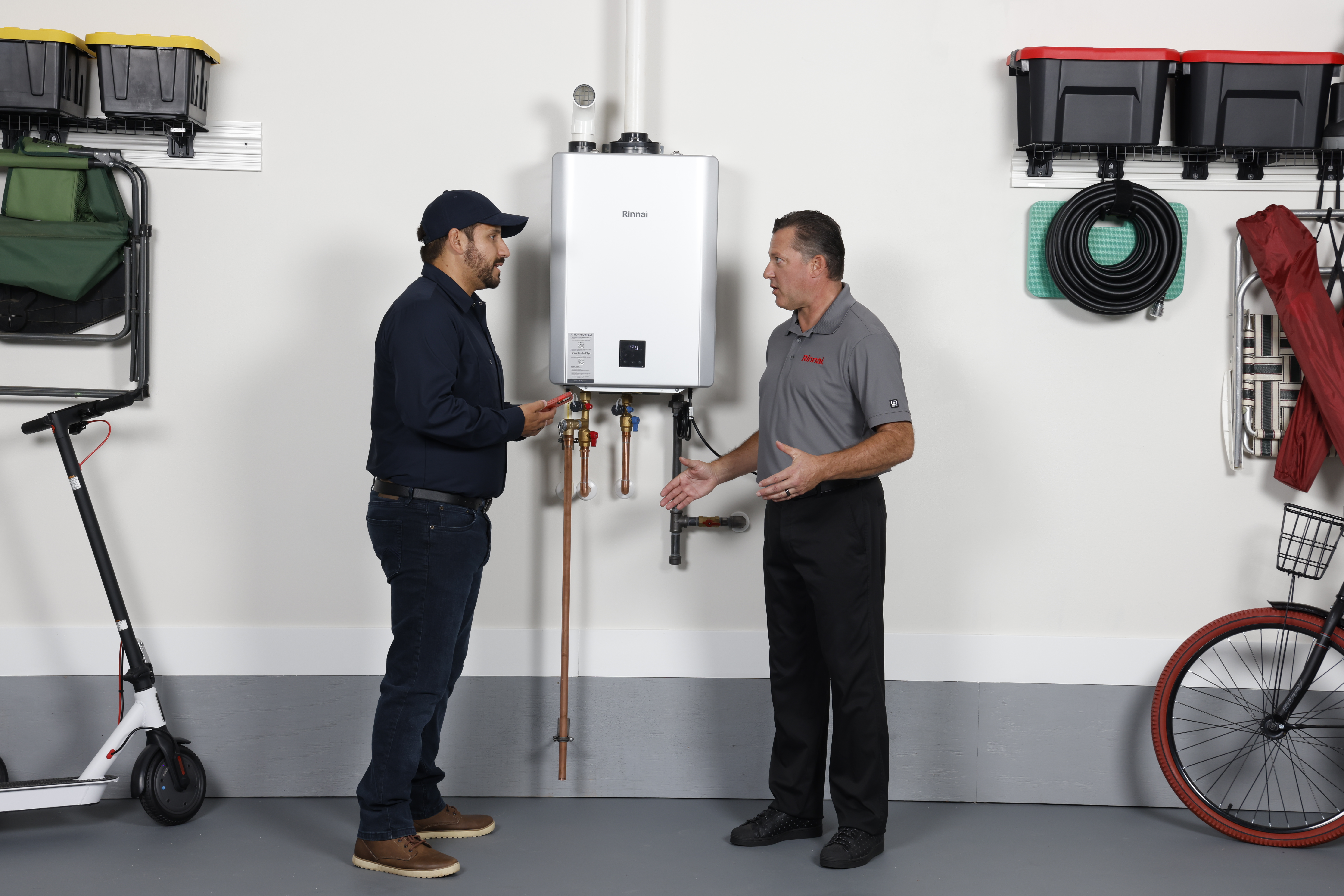 SENSEI RX Installation lifestyle with two plumbers talking