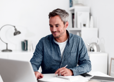 Man sitting at computer desk
